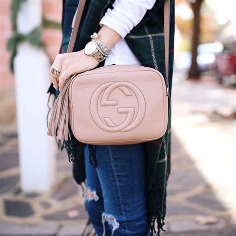 pomegrante gucci disco bag on person|gucci soho bag.